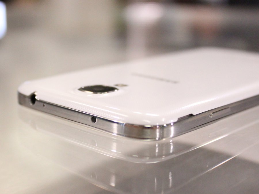 It has a built-in infrared blaster that can be used as a universal remote to control your TV. (The IR blaster is that little black dot at the top of the phone.) The phone also has a special app that pulls in data from your cable or satellite provider and can suggest shows you may like to watch.