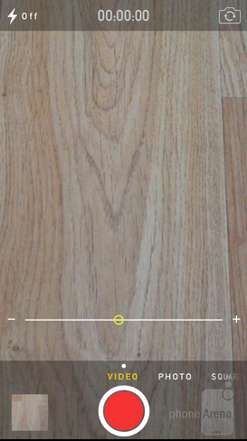  iOS 7 cho phép người dùng zoom vào một đối tượng bất kỳ khi đang quay video bằng một thanh trượt như hình trên.