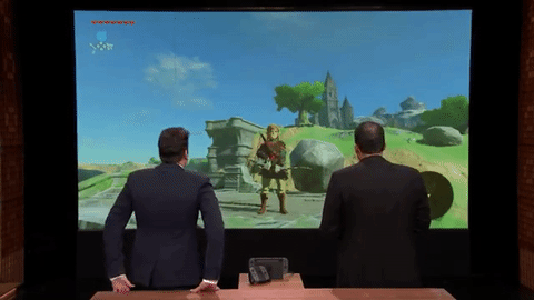  Reggie Fils-Aimé mô tả thế giới rộng lớn của Legend of Zelda cho Jimmy Fallon, đồng thời trình diễn demo sử dụng Nintendo Switch ở chế độ console. 