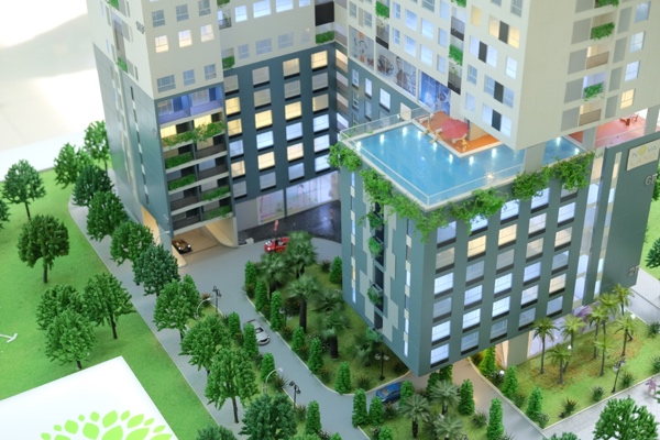  Mô hình một dự án nhà cao tầng được trưng bày bên lề hội thảo “Quản lý xây dựng, chỉnh trang và phát triển đô thị TP.HCM” - Ảnh: H.Đ 