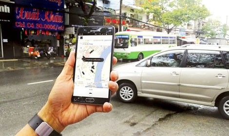 Việt Nam có thể cần một “phiên toà” để giải quyết vấn đề Uber, Grab - Ảnh 1.