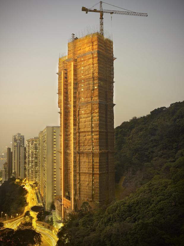 [Ảnh] Ấn tượng với cách người Hồng Kông xây dựng những tòa nhà chọc trời chỉ với giàn giáo bằng tre - Ảnh 9.