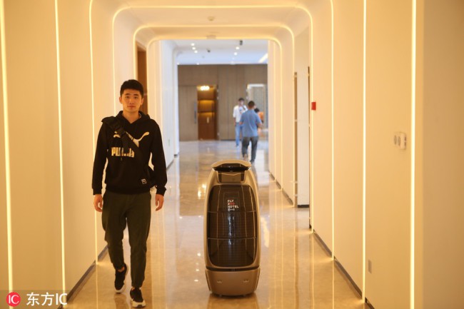 Alibaba khai trương khách sạn tương lai tại Hàng Châu, không cần lễ tân, robot đảm nhiệm rất nhiều việc thay cho con người - Ảnh 2.