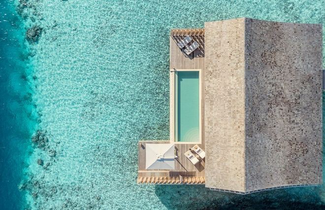 Tham quan khu nghỉ dưỡng xa hoa trên đảo nhân tạo với hệ thống pin Mặt Trời ngay trên mái nhà tại Maldives - Ảnh 7.