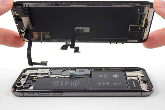 Việc tự sửa chữa iPhone mà không cần tới Apple đang trở nên dễ dàng hơn - Ảnh 1.