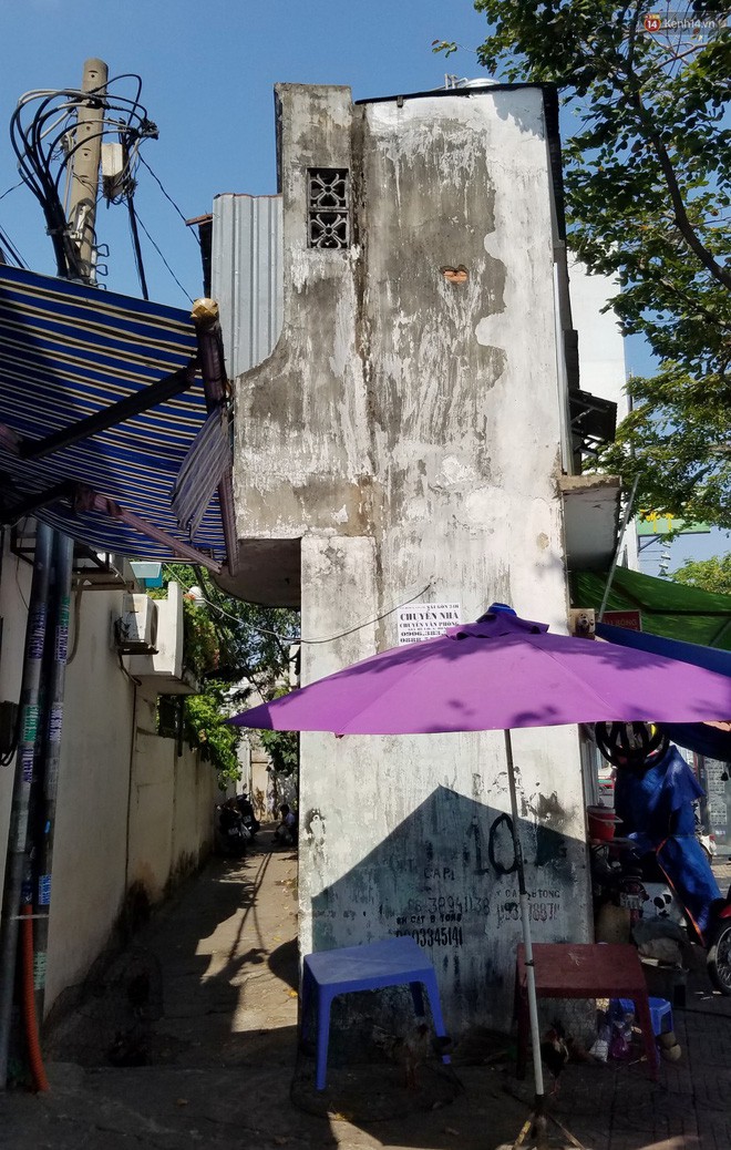 Cuộc sống bên trong những căn nhà siêu mỏng ở Sài Gòn, chiều ngang còn ngắn hơn sải tay người lớn - Ảnh 10.