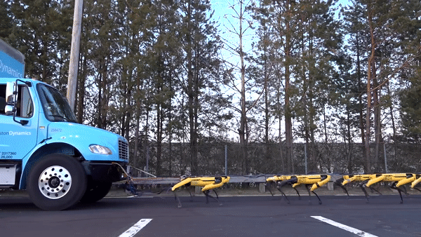 Boston Dynamics cho 10 chó robot SpotMini kéo xe tải để khoe sức mạnh - Ảnh 3.
