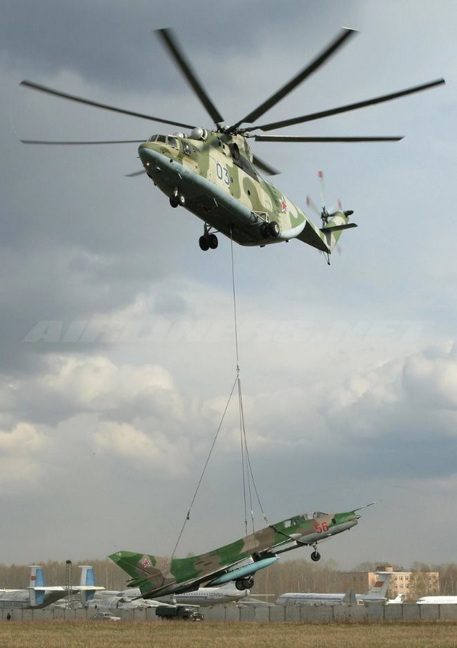 Khám phá trực thăng khổng lồ Mi-26 của Nga: Đã từng chở hóa thạch voi ma mút và máy bay chở khách cỡ nhỏ - Ảnh 12.