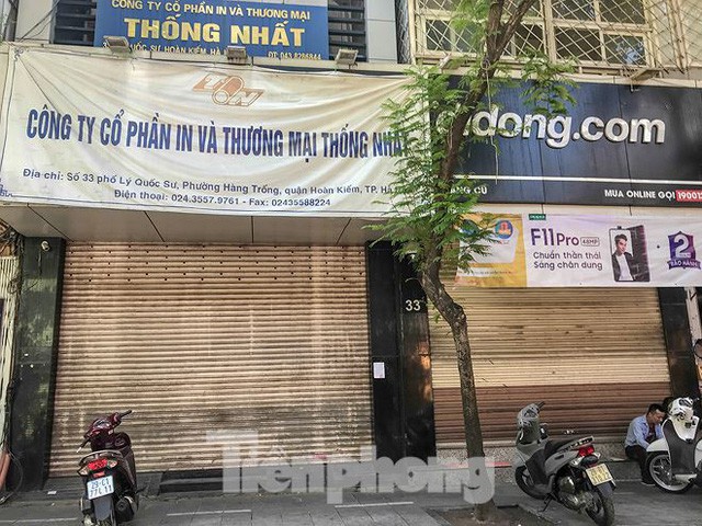 Chuỗi cửa hàng Nhật Cường phủ bạt, che biển sau hơn một tháng ông chủ bỏ trốn - Ảnh 1.