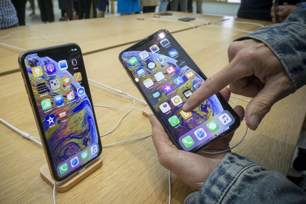 Apple đón tin vui, iPhone và MacBook tạm thoát thuế quan 10% khi nhập khẩu từ Trung Quốc - Ảnh 1.