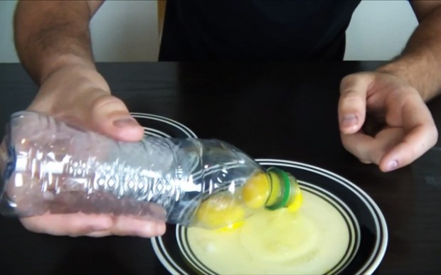 Place a plastic bottle on top of a yoke and gently squeeze to separate egg yolks from egg whites