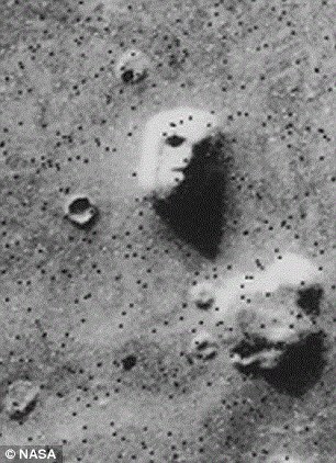 Dr Brandenburg says evidence for the explosions exists near two sites that apparently had life in the past, including Cydonia, the location of the famous &apos;face on Mars&apos; spotted from orbit (shown)