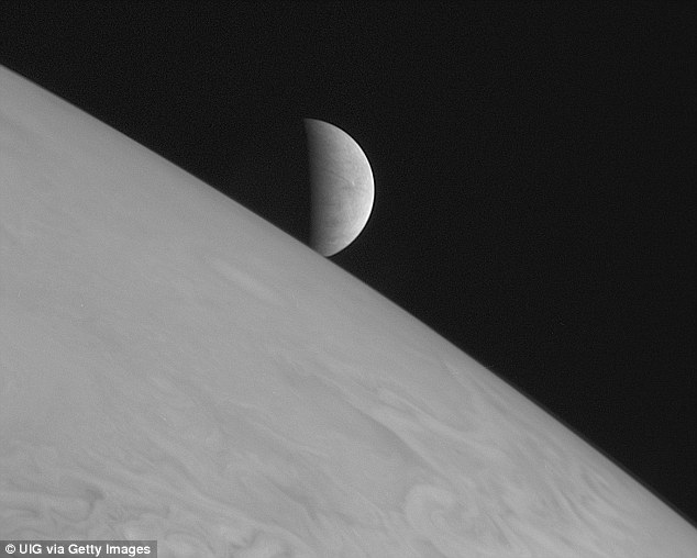 New Horizons took this image of the icy moon Europa rising above Jupiter&apos;s cloud tops. The space agency is planning a mission to Europa, which may launch as early as 2022, to find out whether the moon is habitable