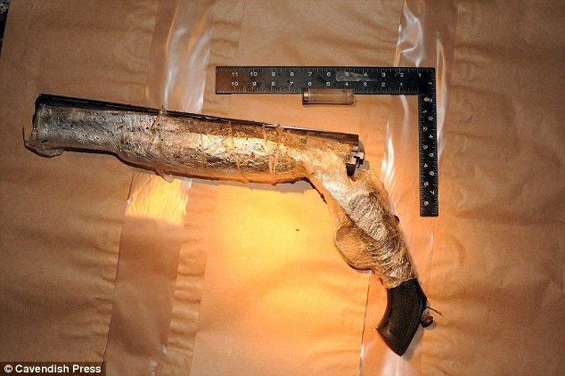 Pictured is Duggans shotgun after police found it wrapped in cling film and dumped in a bush