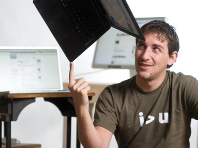 Andrew McCollum designed Facebooks first logo and worked on a side project with Zuckerberg, called Wirehog.