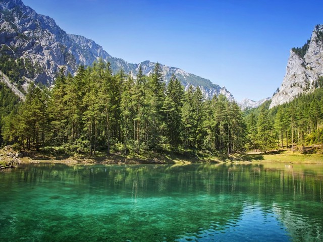 Grüner See (Green Lake), located below Austria’s Hochschwab mountains near the town of Tragoess, seems like just another lake at first glance…