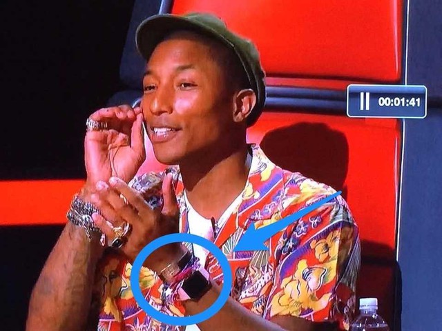 Pharrell Williams wearing an Apple Watch on The Voice