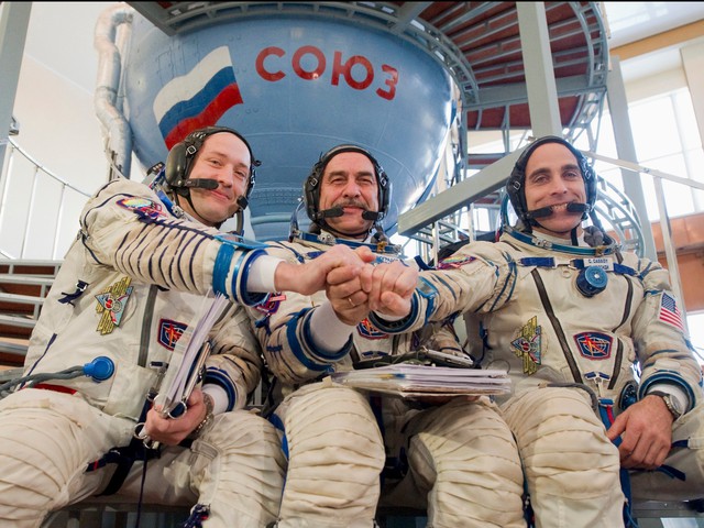 Russian cosmonauts and U.S. astronaut 