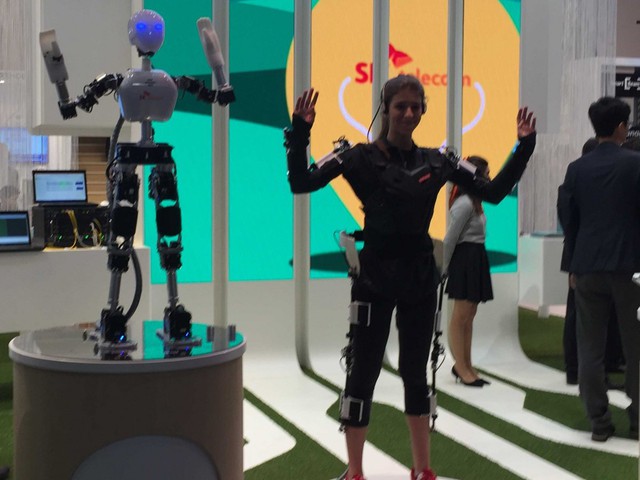 SK Telecom also brought this robot along. It mirrored the movements of the woman on the right.