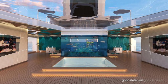 
Bên trong du thuyền là quán bar, phòng ăn, club. Trên phần mái được trang bị một tấm kính lớn để bạn có thể nhìn lên trời, ở giữa là một hồ bơi.

