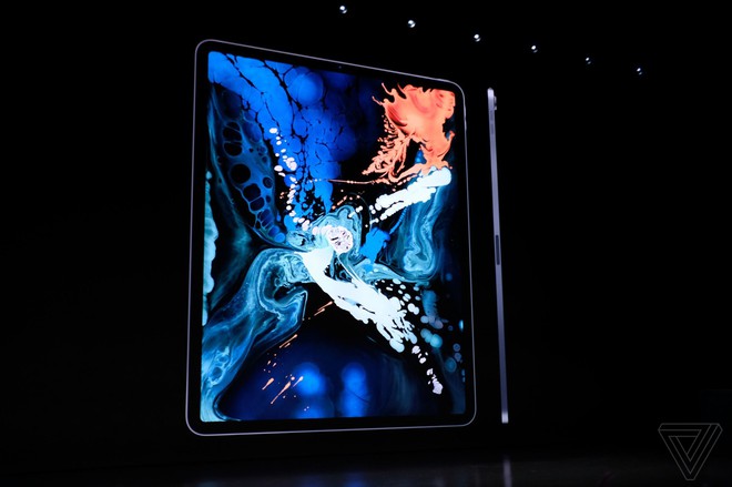 Apple giới thiệu iPad Pro mới, khung vát phẳng như iPhone 5, có Face ID, 4 viền màn hình mỏng đều, bút Apple Pencil mới sạc không dây, giá từ 799 USD - Ảnh 2.