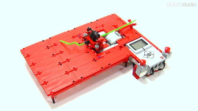 Robot LEGO vô dụng, chẳng biết làm gì ngoài bẻ que thông cống thành những hình dễ thương - Ảnh 1.