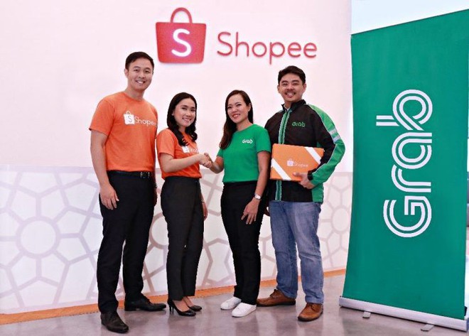 Shopee hợp tác với Grab cung cấp dịch vụ giao hàng trong ngày cho khách - Ảnh 1.