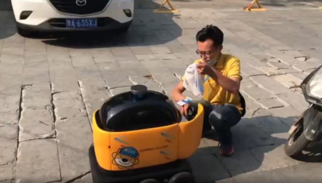 Trung Quốc: Robot vận chuyển tiểu hoàng mã đang đe dọa nghề shipper như thế nào? - Ảnh 3.