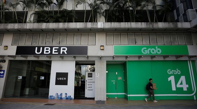 Cho rằng thỏa thuận Grab-Uber gây thiệt hại cho người tiêu dùng, Singapore đề xuất các hình phạt mạnh tay - Ảnh 2.