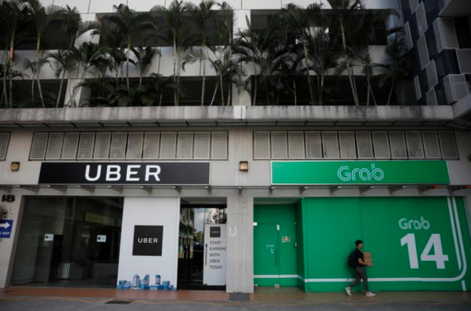 Singapore phạt Grab và Uber 9,5 triệu USD vì sáp nhập làm giảm cạnh tranh thị trường - Ảnh 1.