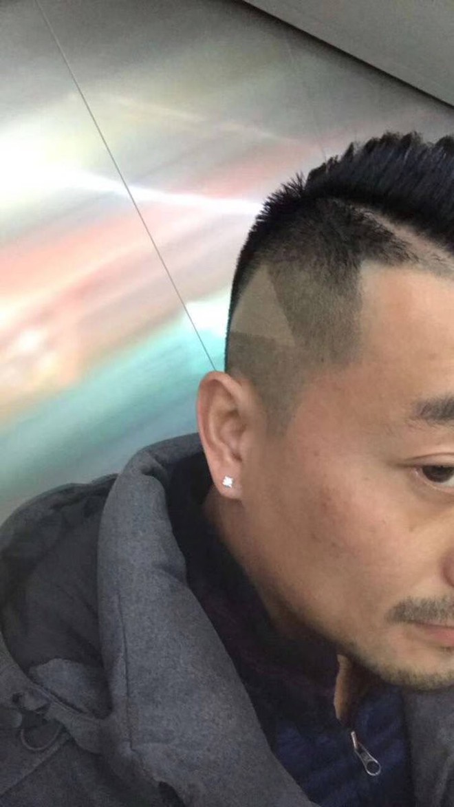 Góc oái oăm: Chụp màn hình ẩu đưa thợ cắt tóc, anh chàng Trung Quốc được luôn nút play trên đầu - Ảnh 2.