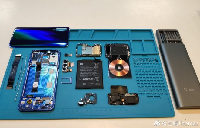 Mổ bụng Xiaomi Mi 9, soi hàng sạc không dây 20W và hệ thống 3 camera - Ảnh 4.