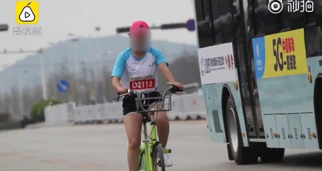 Một nữ VĐV Trung Quốc bị treo giò cả đời vì đạp xe trong giải chạy marathon - Ảnh 3.