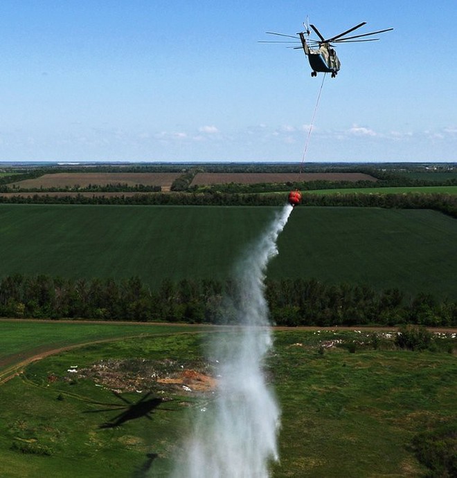 Khám phá trực thăng khổng lồ Mi-26 của Nga: Đã từng chở hóa thạch voi ma mút và máy bay chở khách cỡ nhỏ - Ảnh 14.