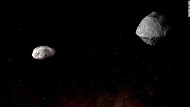 Sáng ngày mai, một cặp thiên thạch có thể gây nguy hại sẽ bay lướt qua Trái Đất ở khoảng cách gần chưa từng có - Ảnh 1.