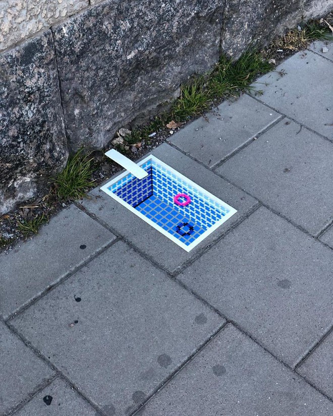 Nghệ sĩ Thụy Điển được tôn vinh vì phá hoại đường phố bằng pixel-art - Ảnh 2.