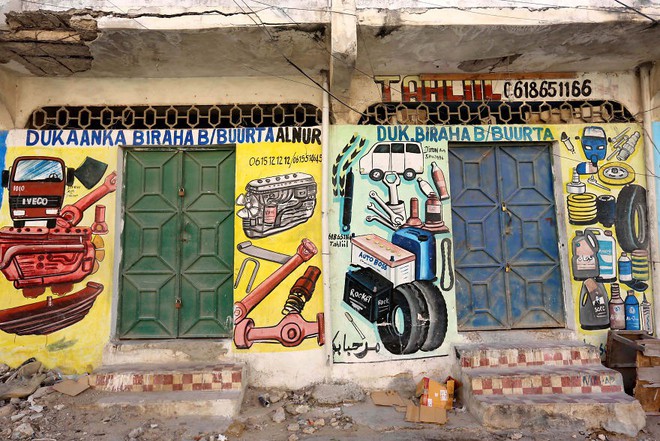 Tỷ lệ mù chữ quá cao, biển quảng cáo ở Somali chủ yếu là hình vẽ không cần đọc nhìn là hiểu - Ảnh 13.