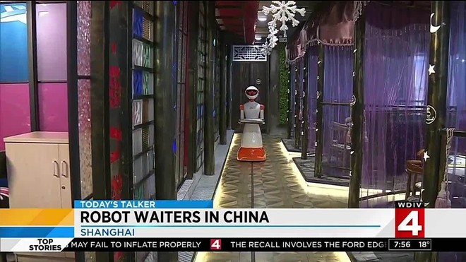 Khi giới trẻ Trung Quốc không muốn làm phục vụ bàn, các cửa hàng đành nhờ cậy vào robot - Ảnh 4.