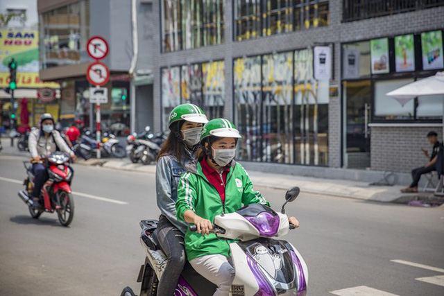  Grab thử nghiệm dịch vụ thuê GrabBike theo giờ tại TP.HCM - Ảnh 2.