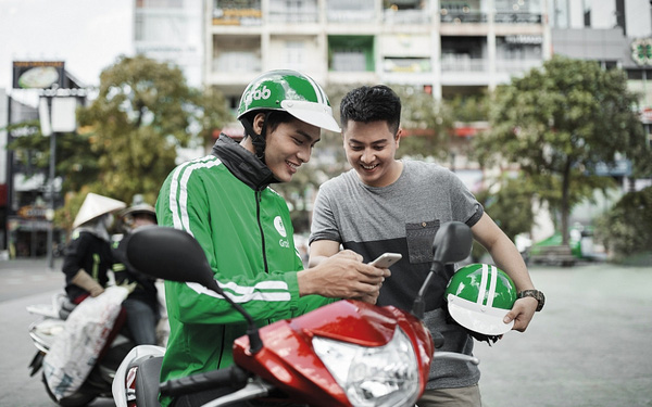  Grab thử nghiệm dịch vụ thuê GrabBike theo giờ tại TP.HCM - Ảnh 1.