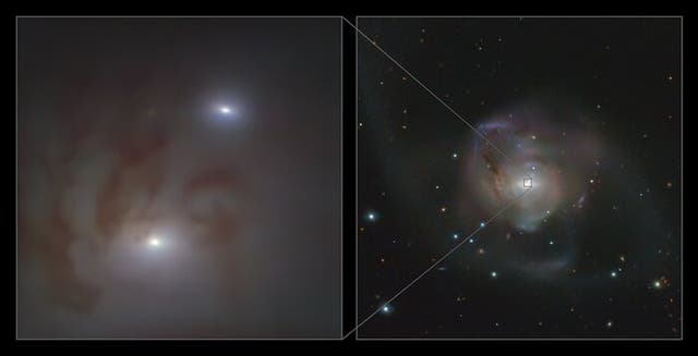 Tìm thấy cặp lỗ đen siêu lớn gần Trái đất, và chúng đang hợp nhất thành một 'con quái vật' - Ảnh 1.