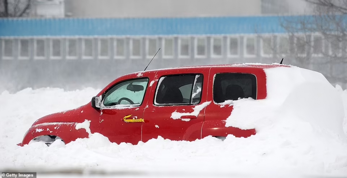 Hình ảnh bão tuyết kinh hoàng ở Mỹ làm hàng chục người thiệt mạng - Ảnh 14.