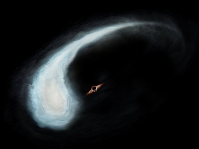 'Nòng nọc' vũ trụ hé lộ một lỗ đen cực hiếm đang ẩn náu gần tâm Dải Ngân hà - Ảnh 1.