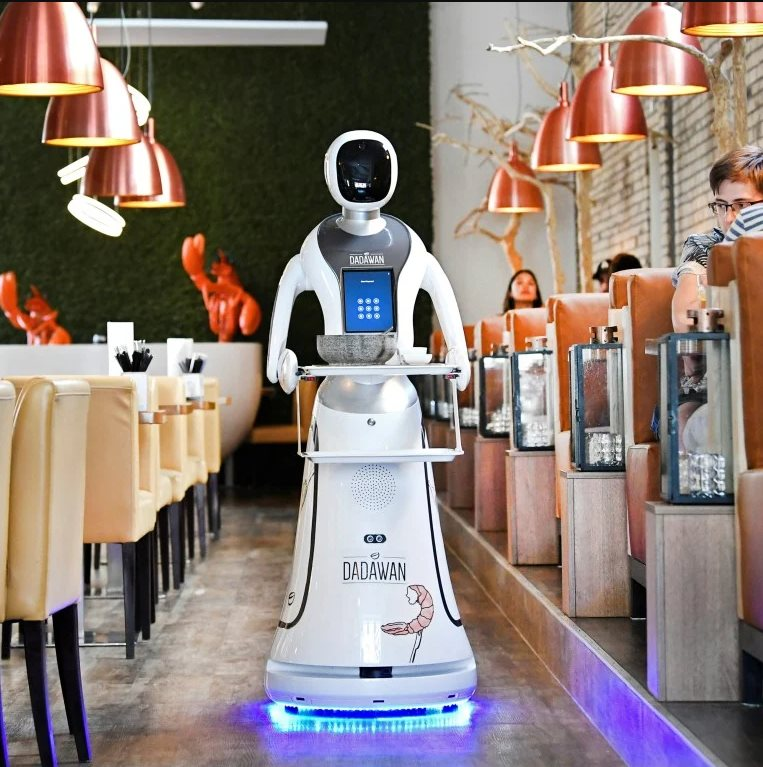 Robot Trung Quốc 'xâm chiếm' các nhà hàng Hàn Quốc, thổi bùng cơn giận dữ và sự lo sợ của người lao động - Ảnh 2.