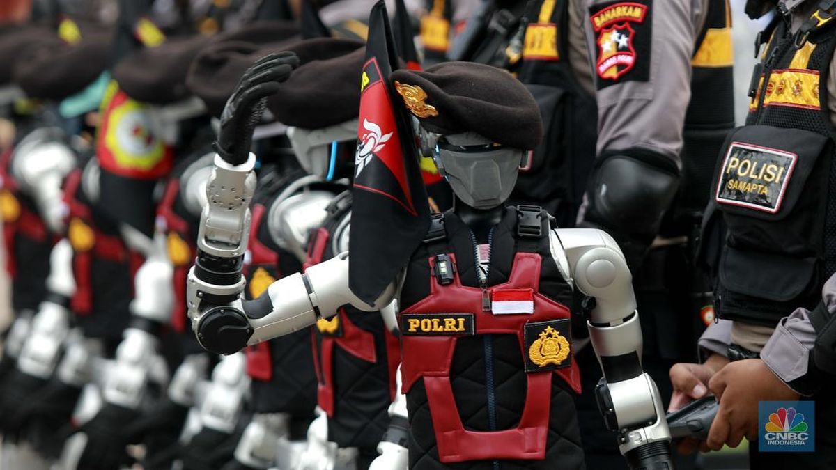 Indonesia ra quân robot cảnh sát nhưng vẫn cần người thật đứng gần điều khiển- Ảnh 1. Indonesia ra quân robot cảnh sát nhưng vẫn cần người thật đứng gần điều khiển- Ảnh 1.