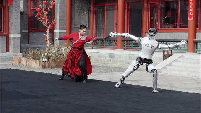Robot hình người Trung Quốc múa kiếm điêu luyện mừng năm mới, phô diễn kỹ thuật đỉnh cao khiến thế giới kinh ngạc - Ảnh 1.