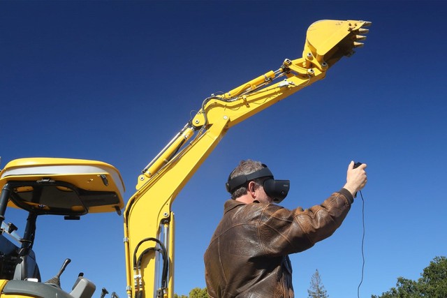 Robotic excavators turn heavy construction work into ... Wii game board - Photo 3.