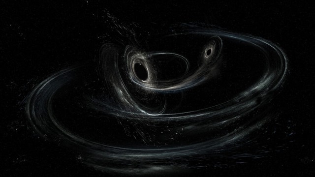 Gravitational waves show that two black holes merge, then shoot away at a speed of 2.5 million km/h - Photo 1.