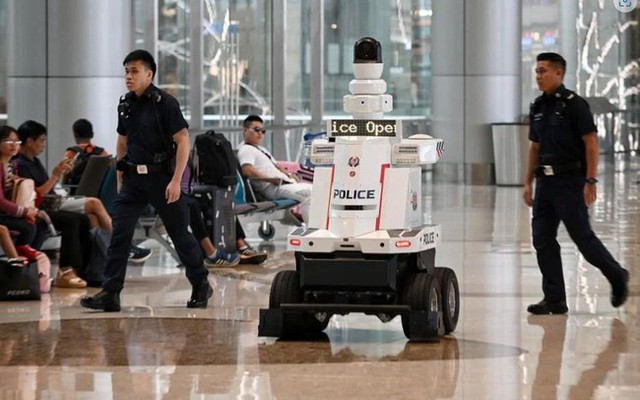 Robot cảnh sát chuẩn bị được triển khai trên toàn Singapore - Ảnh 1.
