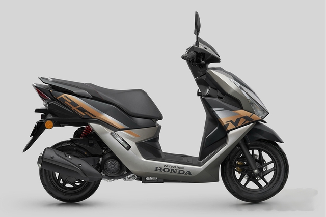 Honda hé lộ mẫu xe tay ga 125cc phong cách "quái thú" dùng động cơ eSP+ - Ảnh 2.